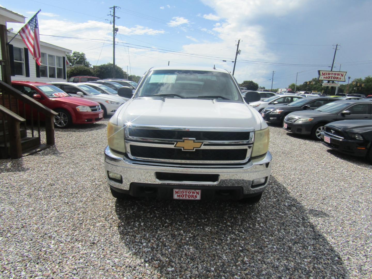 2013 White /Tan Chevrolet Silverado 2500HD LT Ext. Cab 4WD (1GC2KXCG3DZ) with an 6.0L V8 OHV 16V FFV engine, Automatic transmission, located at 15016 S Hwy 231, Midland City, AL, 36350, (334) 983-3001, 31.306210, -85.495277 - Photo#1